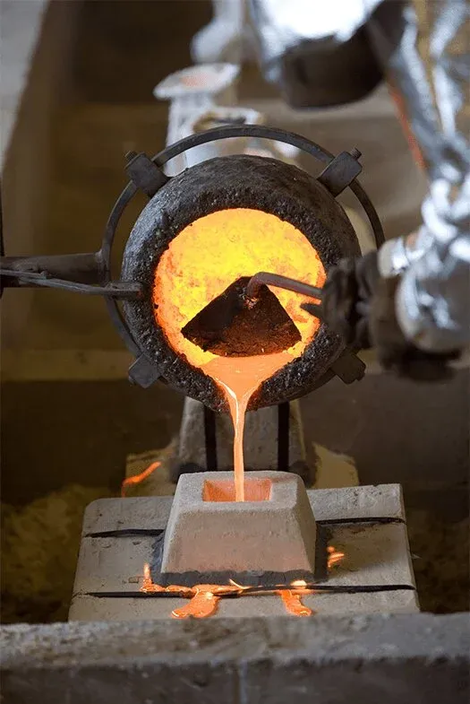 Pouring smelted gold